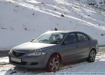 Car driving in the snow