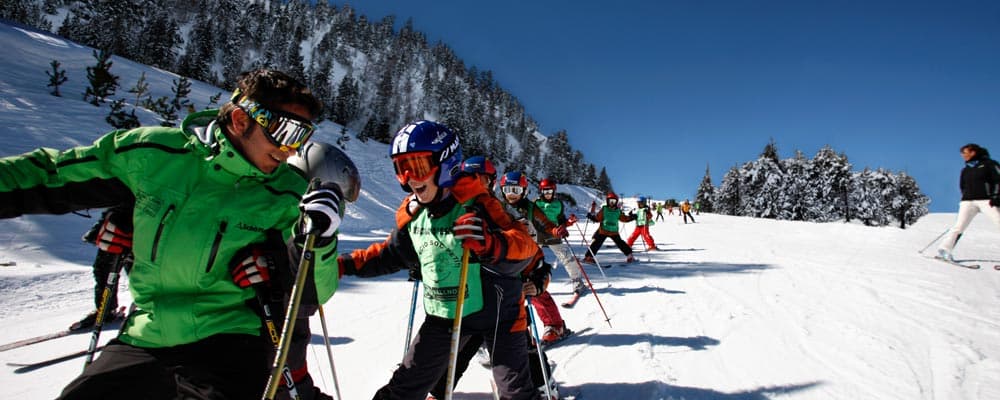 Ski instructor and class