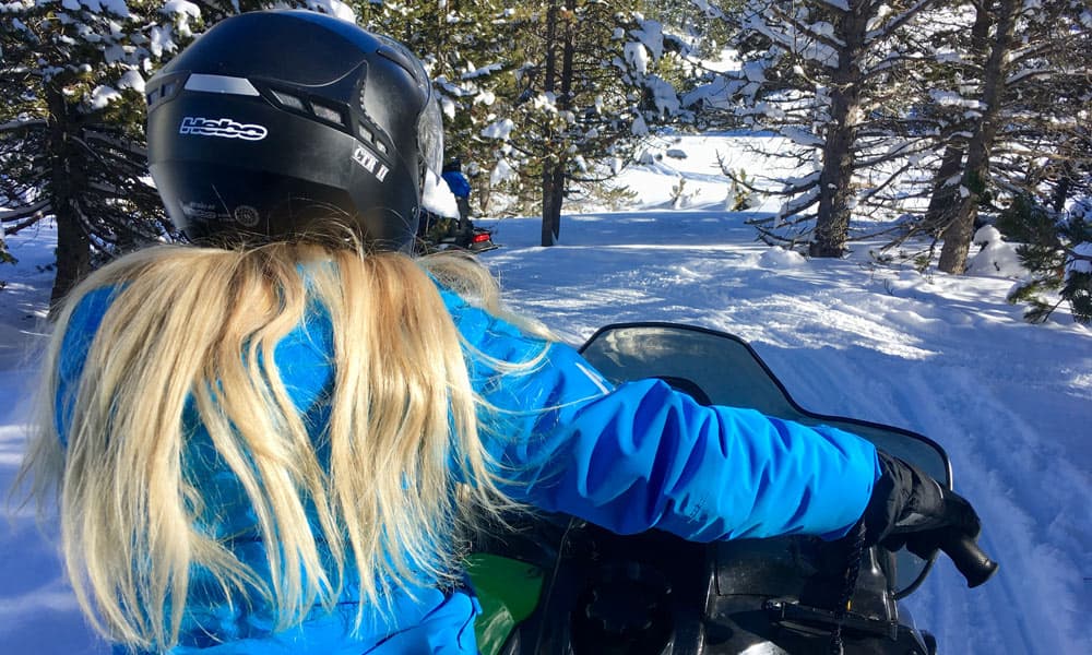 Girl on snowmobile