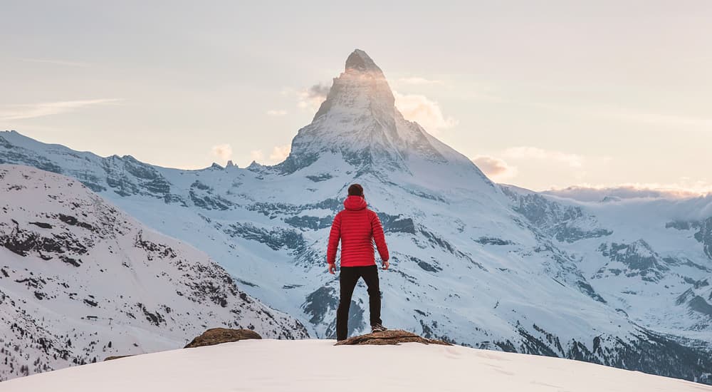 Man on top of mountain
